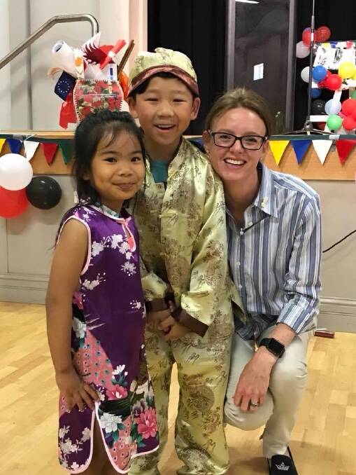 CELEBRATION: Member for Cootamundra Steph Cooke with two younger YADMA members at the end of year party.