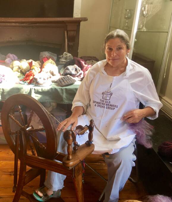 SOFT AND PRETTY: Maria Wyllie demonstrated her spinning craft at the Murringo Village Fair. Photo: Marg Gillespie.