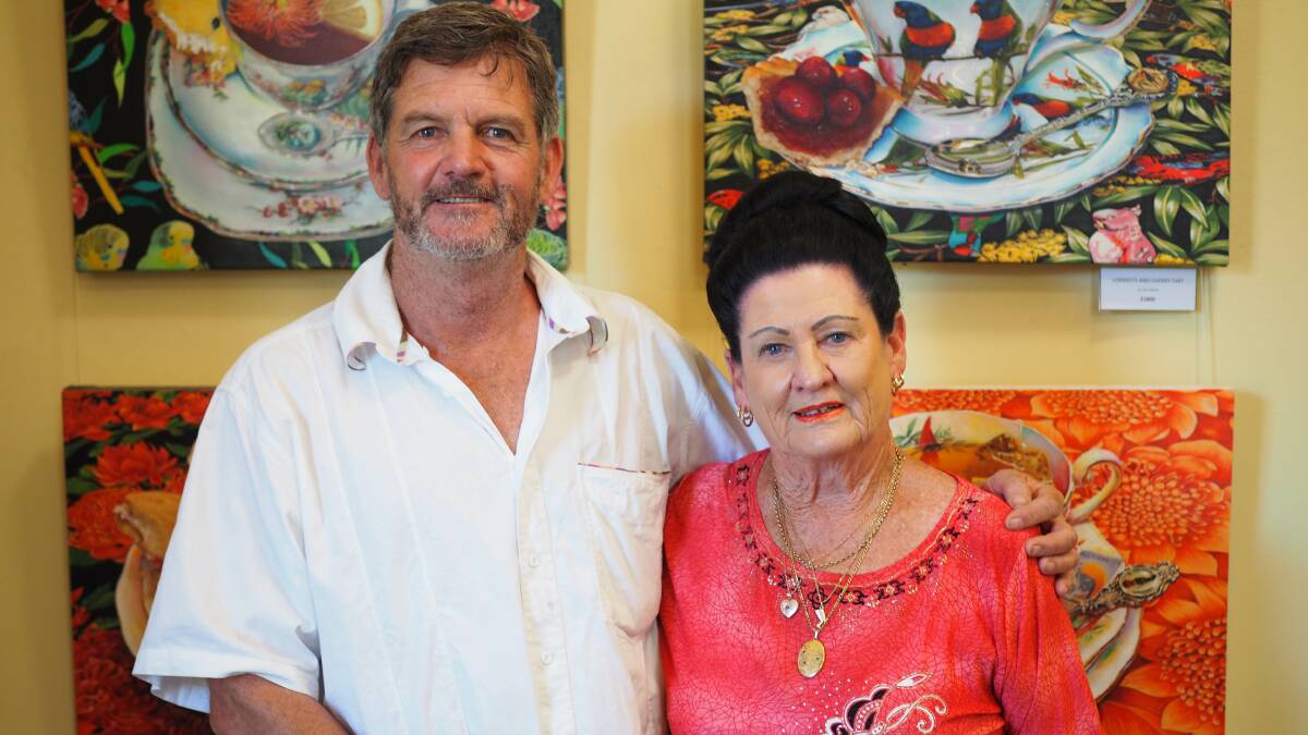Artist Paul McKnight and Helen Flanagan with some of the artwork on display over the weekend at the Burrangong art gallery.