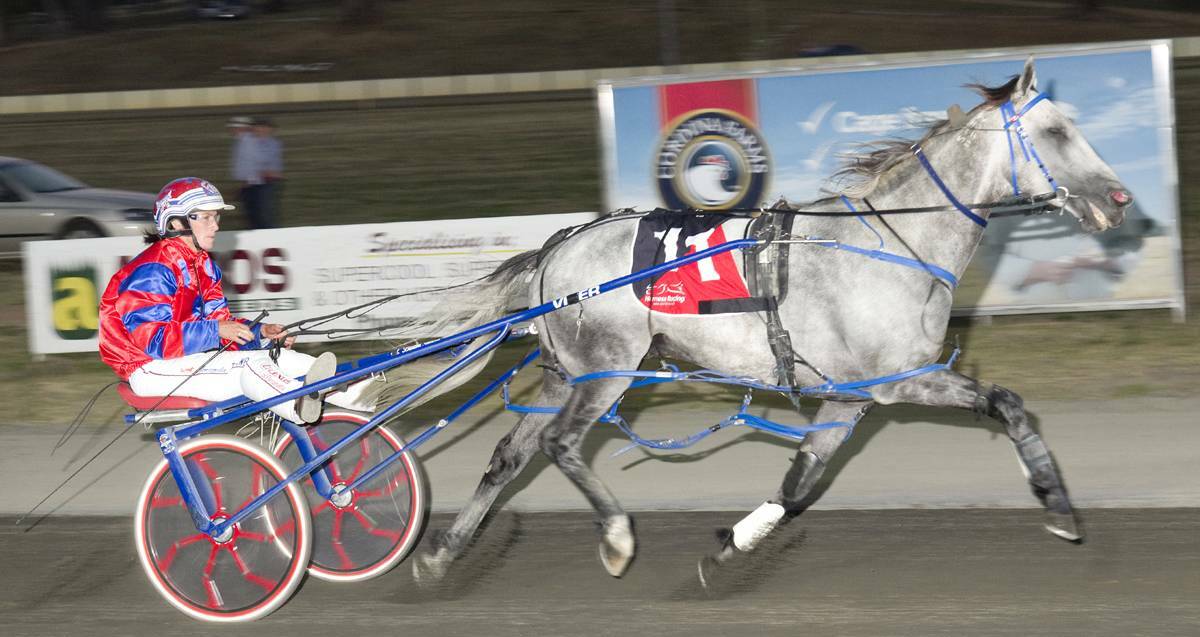 REGULAR: Amanda Turnbull, driving Blue Double Dee to victory in the 2013 Cherry Festival Cup, is now up on alleged race fixing charges.