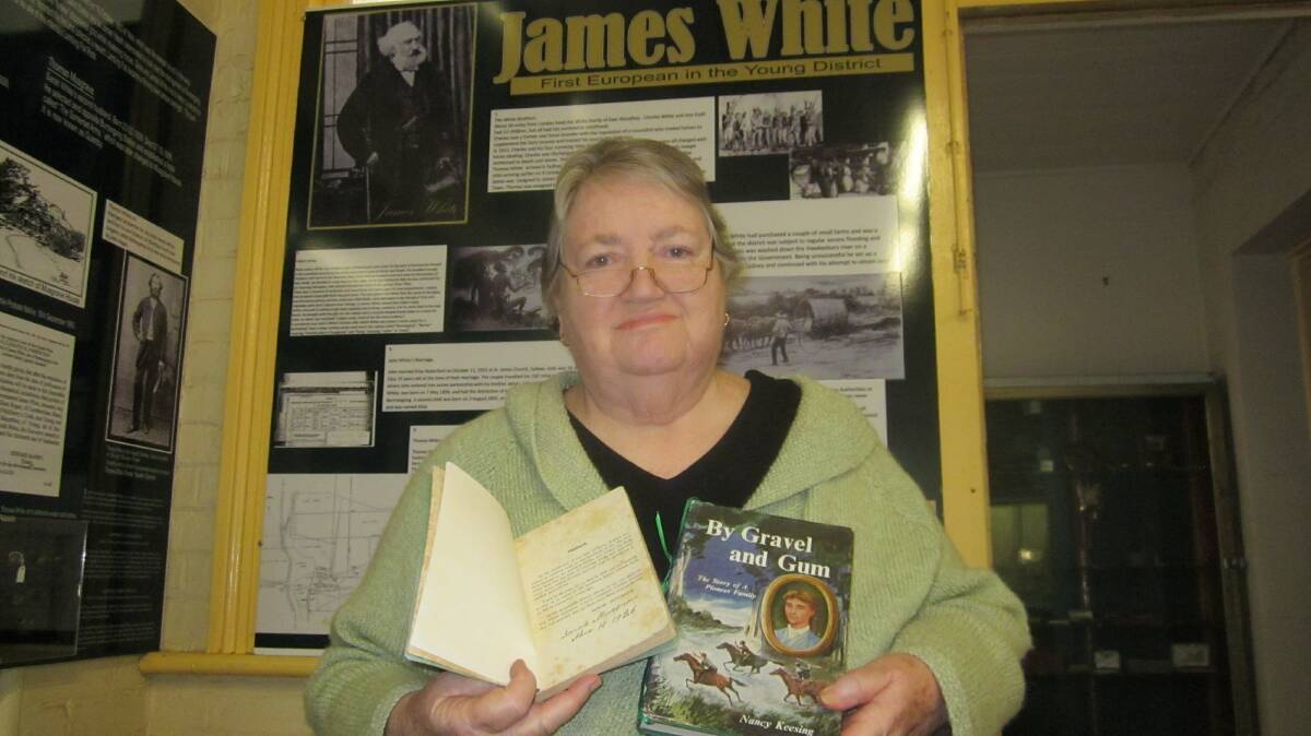 VERY GRATEFUL: Sandra Jenner holding the two books donated by Brian English. Photo: Brian James.