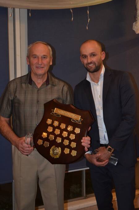 Dave Webster and Nathan Lyon with their awards.