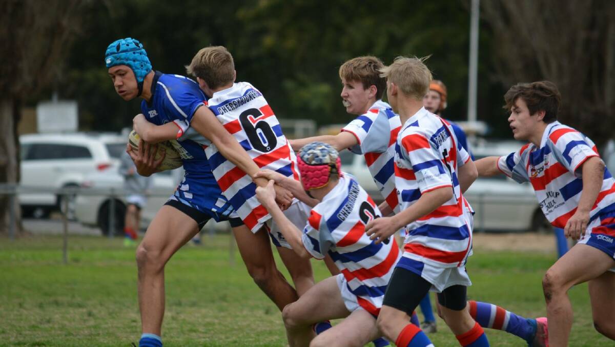 TACKLE HARD: The Under 15s will have a second shot at the grand final this weekend. Photo: Brooke McIllhatton.