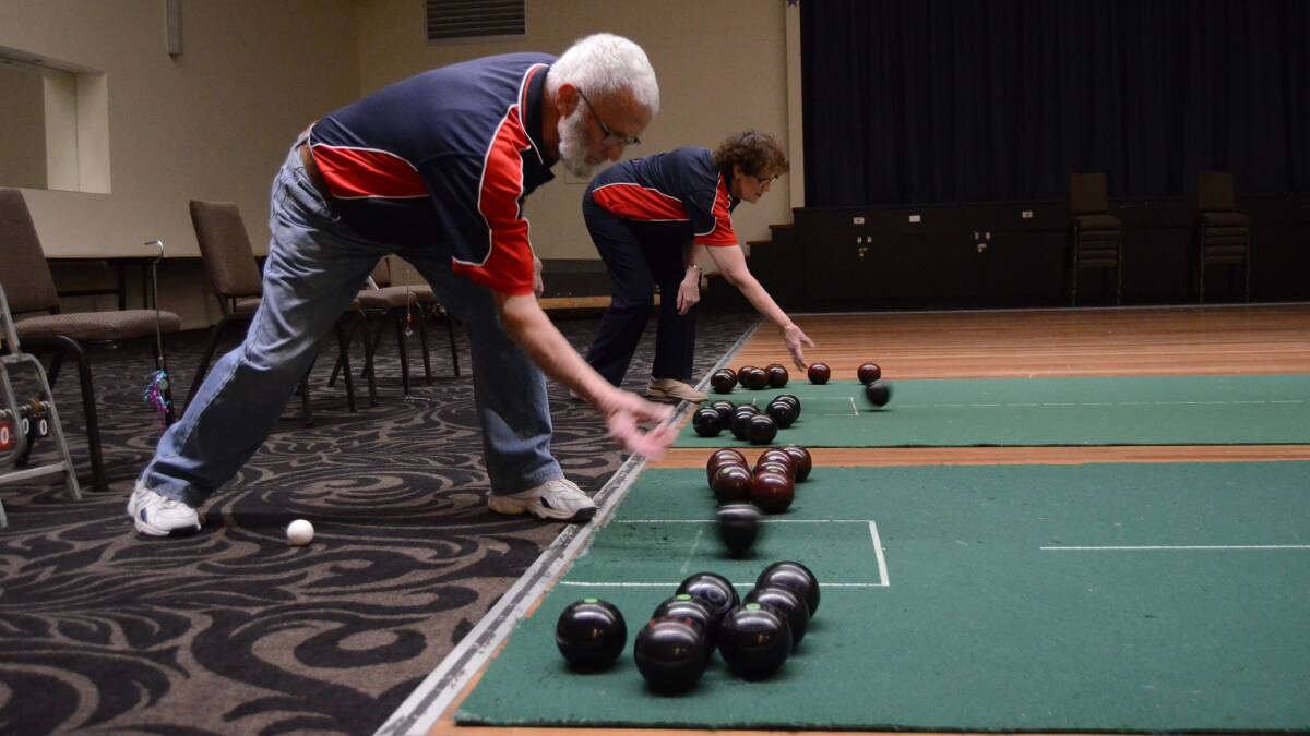 GIVE IT A TRY: Young Services Club Indoor Bowls invites everyone to give the game a go.