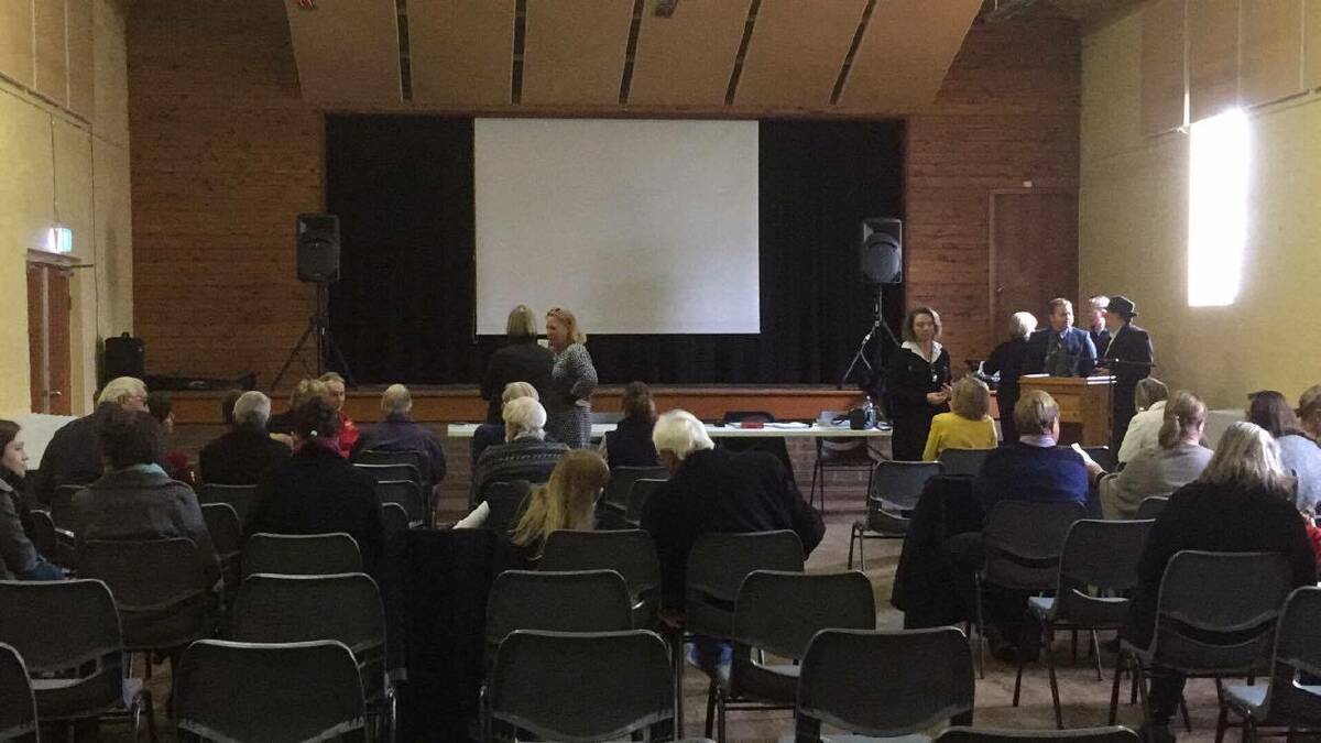 TENSE: The crowd slowly started to build on Wednesday before the Open Forum on the Eulie piggery. Photo: Rebecca Hewson.