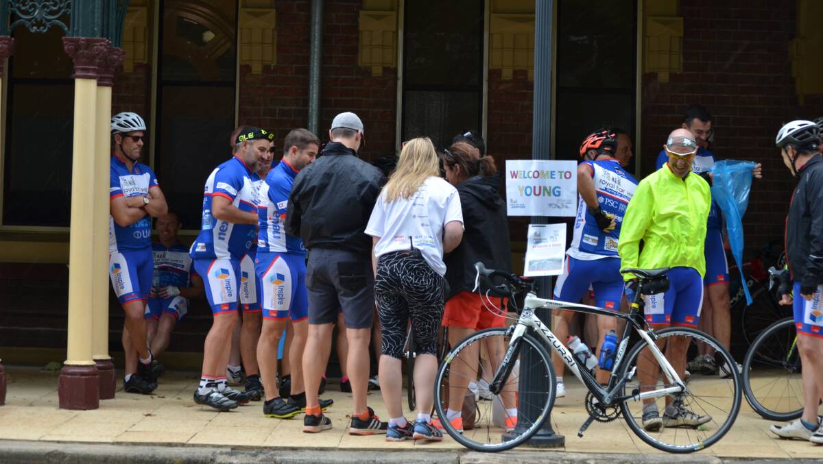 A SPOT OF TEA: The Royal Far West Bike Ride stopped off in Young on Monday morning for morning tea at Anderson Park. Photo: Craig Thomson.