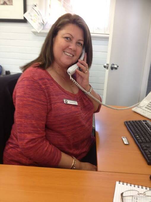 PHONE IT IN: Hilltops Hub admin clerk Samantha Mitchell ringing around local organisations. Photo: Supplied.