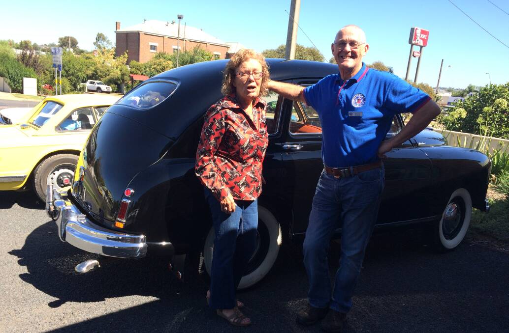 SOMETHING SPECIAL: Young CWA president Lyn Callaghan and president of the Standard and Triumph Vintage Car Club Bruce Beresford with Bruce's Triumph.
