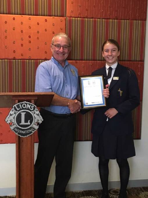 ROARING WIN: Marylouise Minehan being awarded by Lion Stuart Freudenstein at the 2018 Lions Youth of the Year in Young.