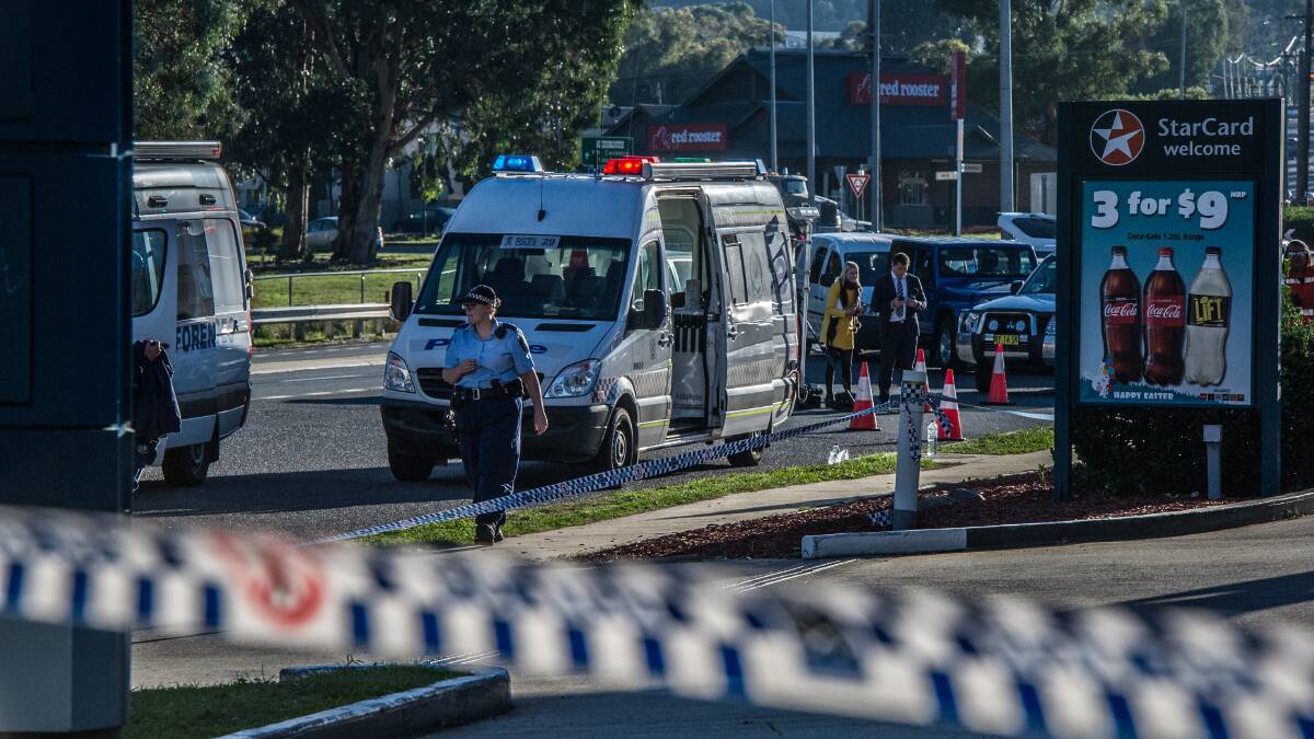 Police on scene at a service station in Queanbeyan where a 17-year-old from Young allegedly stabbed a service station attendent to death. Photo: Karleen Minney