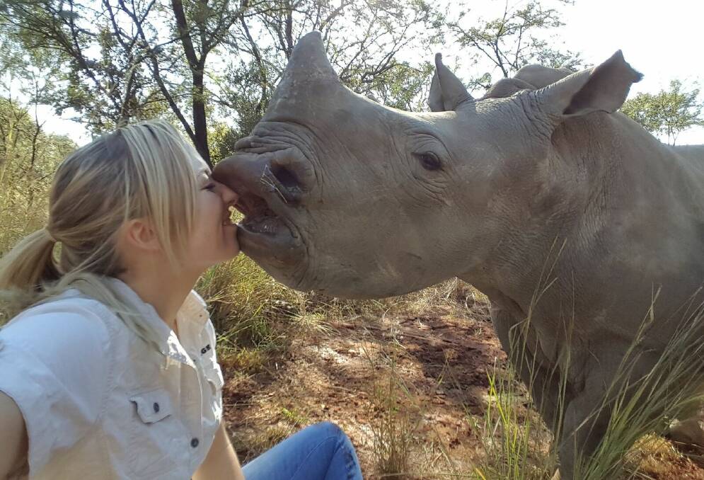 Affectionate: Laura Ellison and Grace at The Rhino Orphange in South Africa. “I just have this real desperation to help them,” Laura said.  