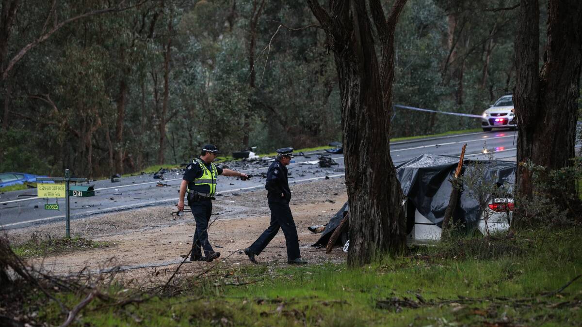 TRAGIC SCENE: Two men were killed during a head-on crash on Beechworth-Wodonga Road at Wooragee on Friday morning. Pictures: JAMES WILTSHIRE