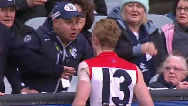Clayton Oliver argues with a Carlton fan in the match at the MCG on Sunday.  Photo: Fox Sports
