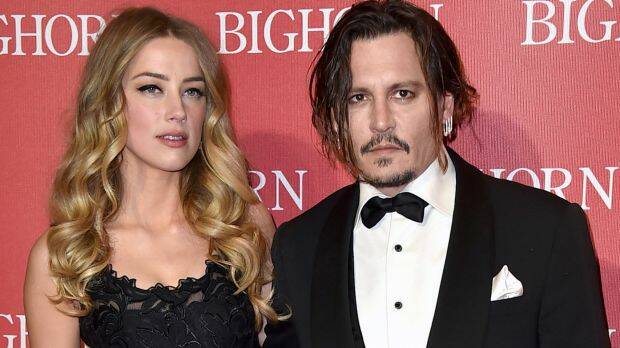 Amber Heard, left, and Johnny Depp in 2016 before their separation.  Photo: Jordan Strauss
