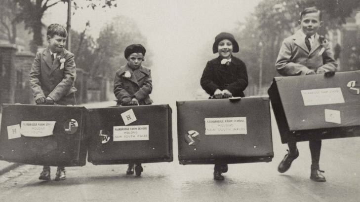  Image depicts four children, two boys and two girls, carrying large suitcases down road. Inscribed on back 'SS ORONSAY 23 April 1938. L to R: Edward (Ted) Gamsley, Mary Simpson, Clara Park, Cyril Lord. Ted Gamsley is still alive and lives in Molong. The other three have passed away'. Photo: Supplied