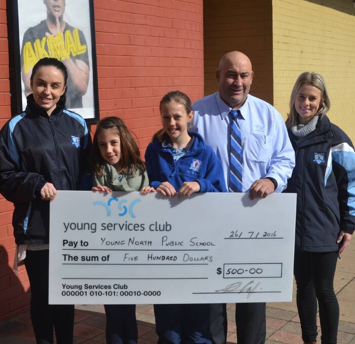 At the Young Services Club cheque presentation to the Young North aerobics team were Jessica Temoananui (teacher), Ella Milne, Libby Wilder, Brad Pettit (Duty Manager), and Holly Cullen (teachers aid).