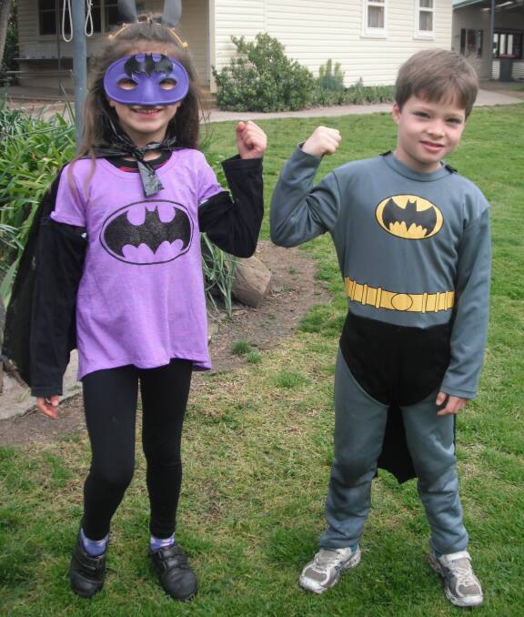 STRONG: Batgirl Heidi Hajsinger-Waru and Batman Jack Dowling.look ready to stop some villains.