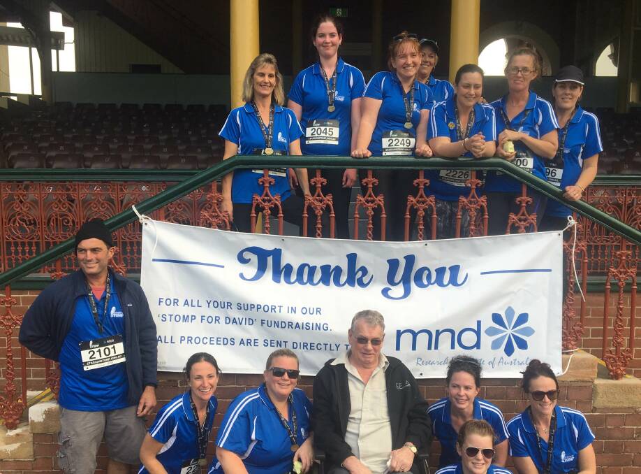 FINISHED: The Young team after they finished racing up more than 6,500 stairs are, back from left - Louise McKnight, Mikaela Kelly, Tammie Edwards, Natasha Guida, Amanda Smith, Michelle Cronin, Melissa Wark; front - Chris Wark, Karen Thornhill, Katrina Bannister, David Flett (MND sufferer), Tarnia Flett, Ashlynn Bannister and Jeni Ward.