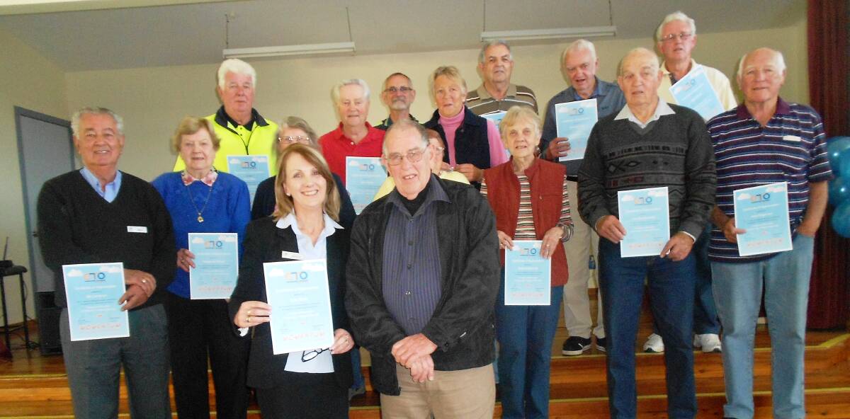 Phil Lindsay Vice Chairperson Coast & Country Community Services, presented long service certificates to the Community Transport volunteers. 
