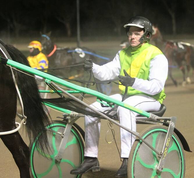 BIG MOMENT: Young's Nic Dewar drove Elegant Heaven to a win in race 7 at Canberra last Saturday night.