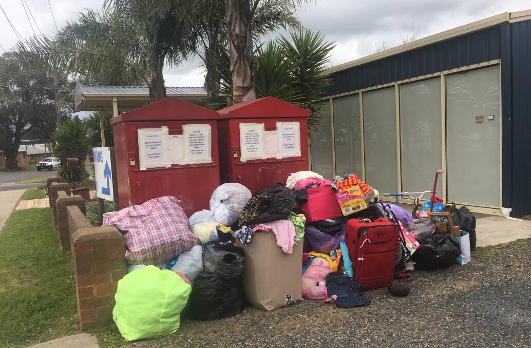 SALVOS: Second-hand goods piled up in front of the Salvation Army store in Young on Sunday afternoon. 