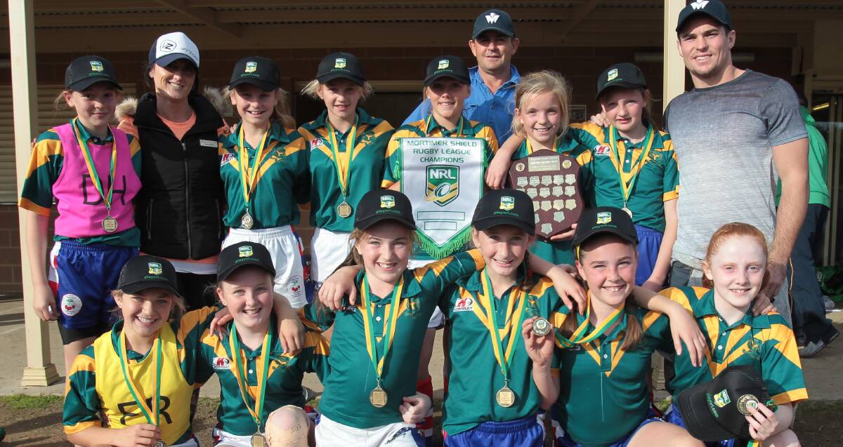 CHAMPIONS: Young Public School's league tag team celebrate their victory in the Mortimer Shield at Parramore Park on Tuesday. Picture: Les Smith