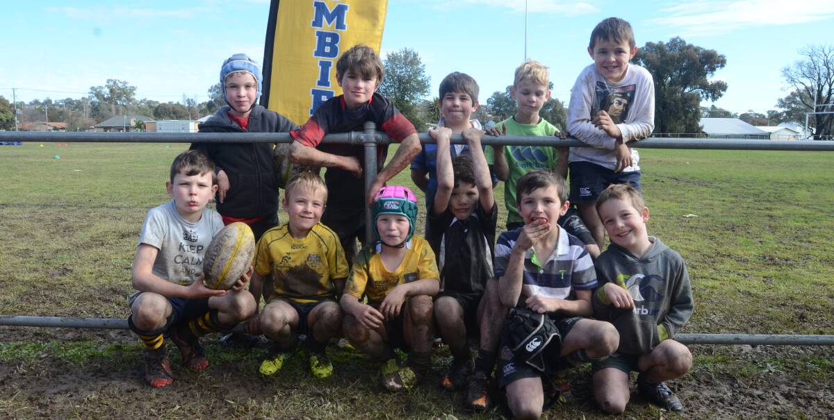 MUDDY: The mud didn't stop these junior rugby players from getting in on the action of the Brumbies clinic at Hall Bros Oval.
