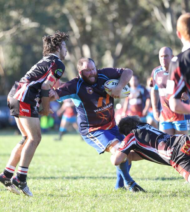 INTENSITY: Burrangong Bears' Josh Logue and Brett Campbell take down a Binalong Brahman player back in Round 5 of the Woodbridge Cup. Photo: RS Williams Photography