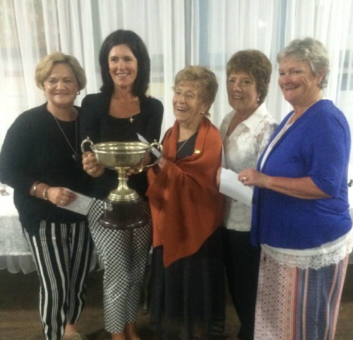 Life Members: Wendy Tuckerman, Ros Anderson, Larraine Nicolls and Kate Cooper being presented with the Ryrie Cup by SWLGA life member, Jenny Leahy, at the 2016 South West Ladies Golf Championships held at Cootamundra last weekend.