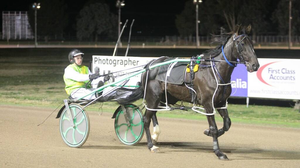 WINNING DOUBLE: Elegant Heaven, driven by Nic Dewar, holds on to defeat Big Dance and Jungle Dancer in race 7 at Canberra last Saturday night.