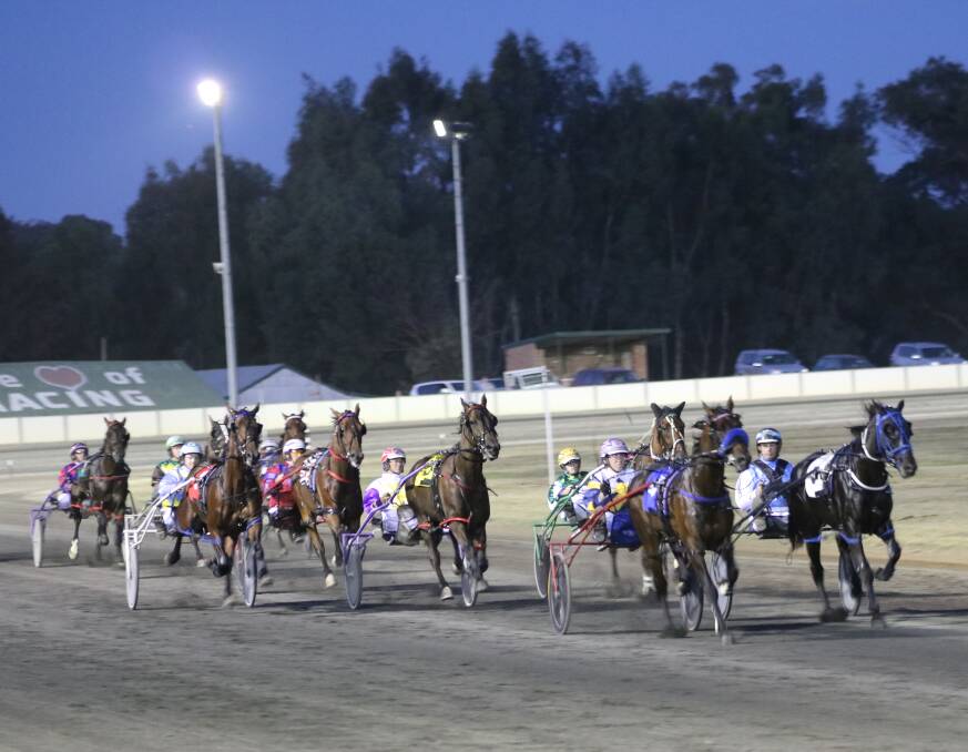 OFF AND RACING: Pacing action at the Young Harness Racing Club.Picture: Amanda Langman.