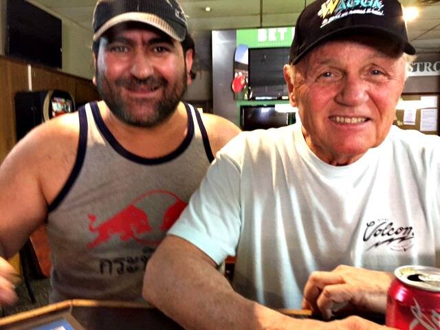 GOOD VIBRATIONS: Beach Boy Bruce Johnson at the Great Eastern Hotel with hotel owner Jay Mahaeb.
