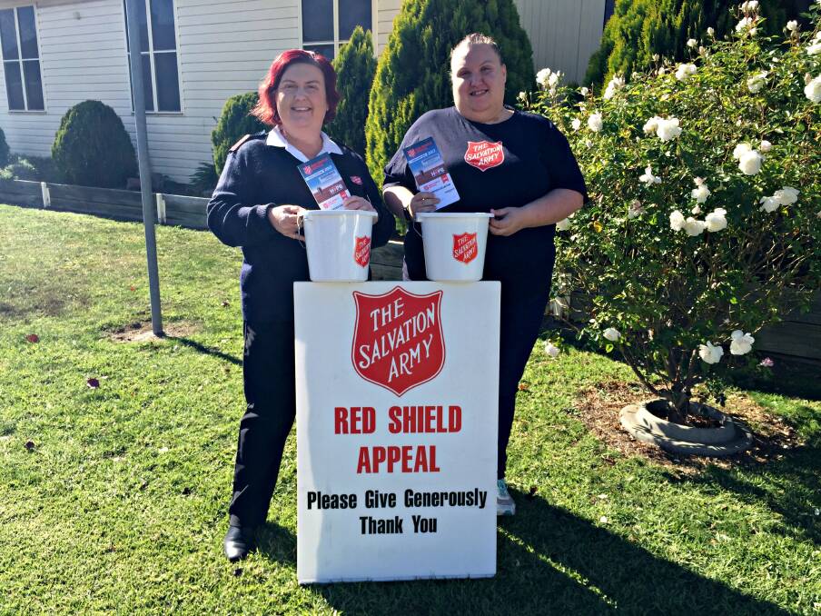 Rattling the tins: Lesley and Tamara Newton will be out and about in Young collecting for the Salvation Army's Red Shield Appeal. Picture: Craig Thomson.