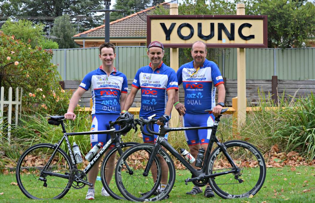 Ride for kids: Andrew Nieland, Mike Tomalaris, host of SBS Tour de France coverage, and Young's Sean Sampson. Picture: Craig Thomson. 