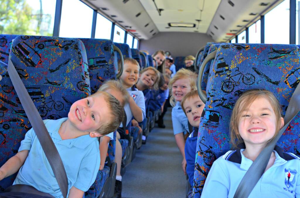 The wheels on the bus go round and round: Young North Primary School students took part in a bus safety program this week. Picture: Craig Thomson.