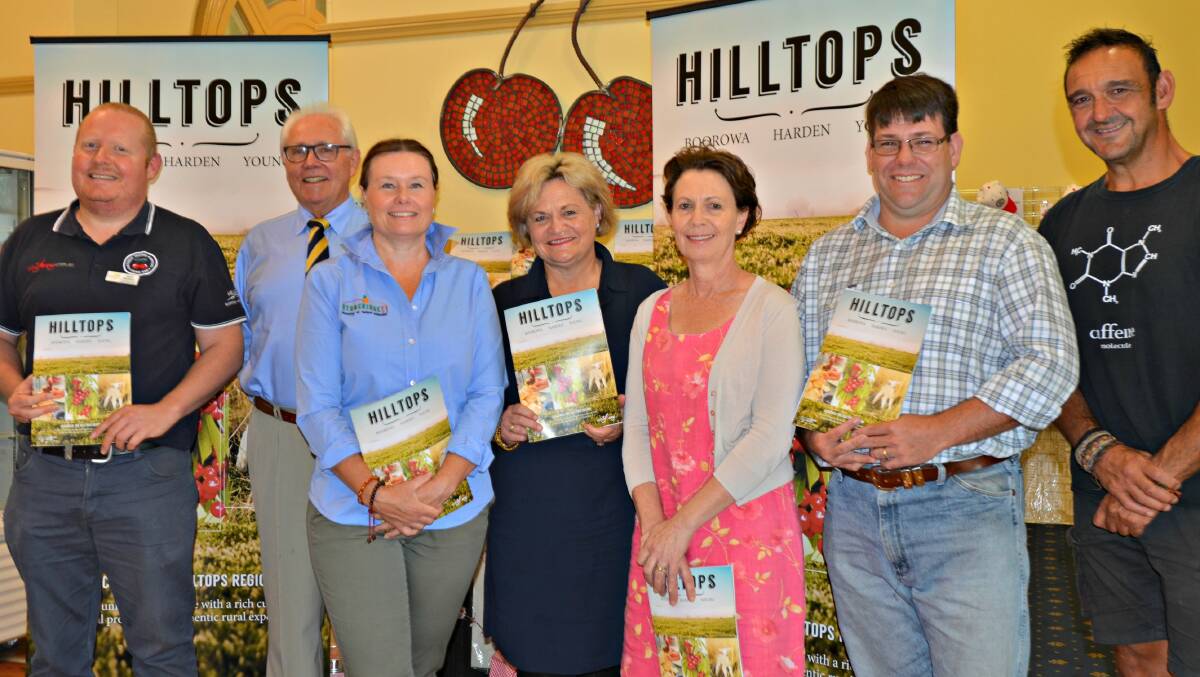 Guide: Local tourism and business people joined Wendy Tuckerman (centre) to launch the Hilltops region visitor guide. Picture: Craig Thomson.