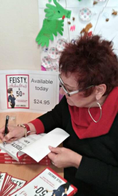 Book signing: Author Julie Ankers visited the Young Library earlier this month to promote her book “Feisty, fabulous and 50 plus”.