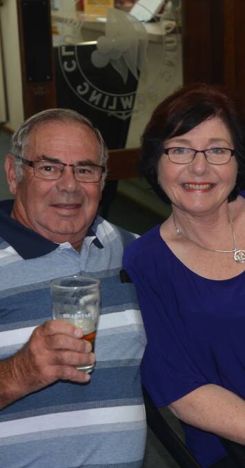 Chris and Diana Fraser raising a glass at the bowling club.