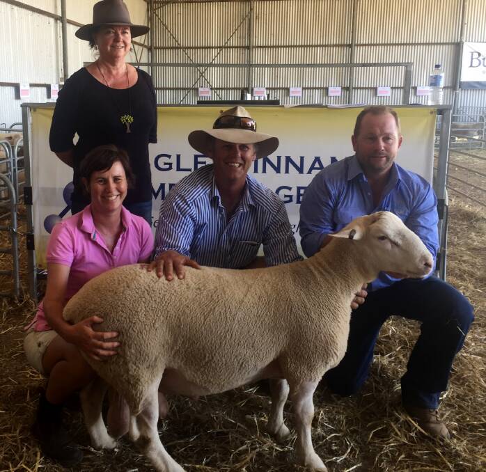 Baa: S & G Affleck from Greenbraes Wombat with their top priced ram with Anna Hayes (vendor) and Phill Butt (agent).