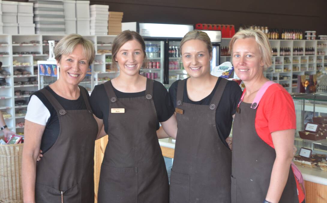SHOP LOCALLY: Vicki Powderly, Kate Sporing, Sophie Dunn and Chloe Powderly of Poppa's Fudge Factory say shopping locally is important for the town's economy. Picture: Craig Thomson.