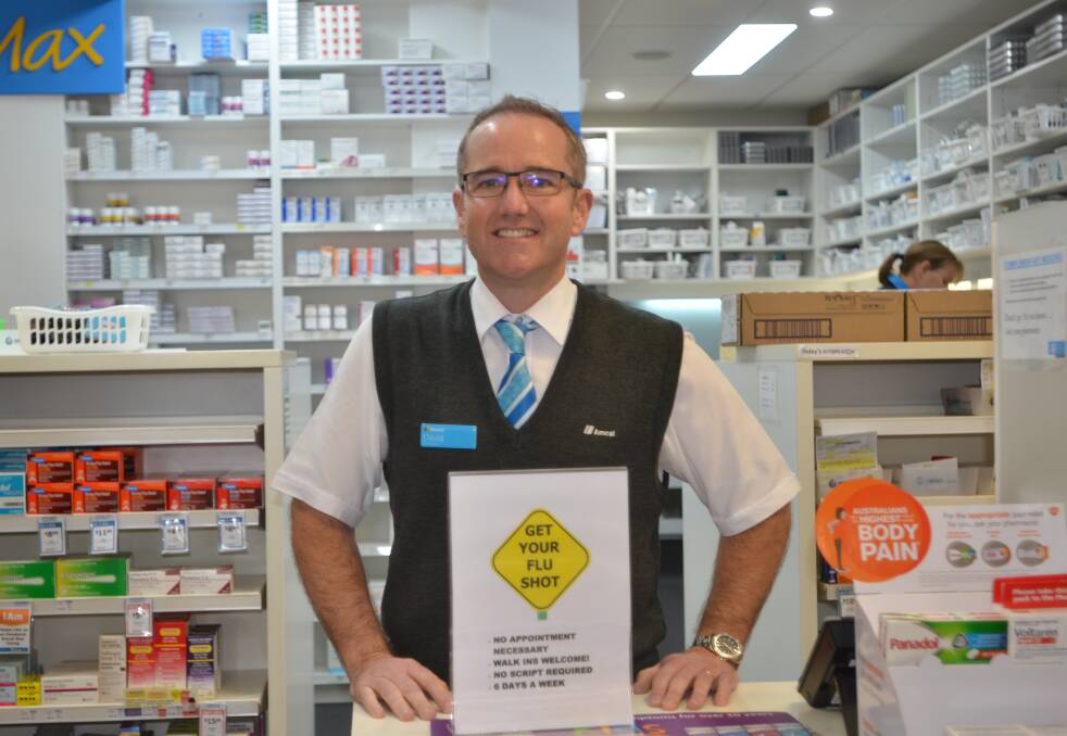 Shot in the arm: It is not too late to get a flu shot according to Pharmacist David Hamblin. Picture: Isaac Northcott.
