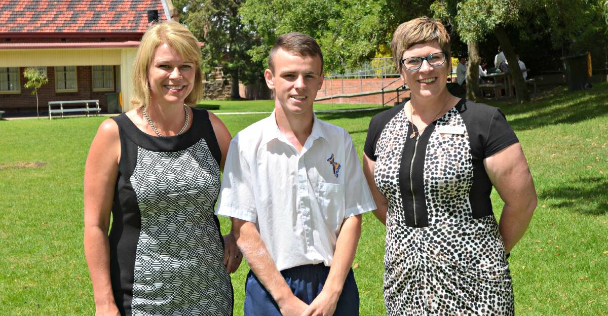 Excellent adventure: Hennessy student Tyler Cashel (middle) with Katrina Hodgkinson (left) and and Trazel Scott (right). Picture: Craig Thomson.