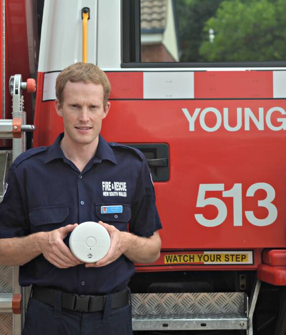 HELPING HAND: Young Fire and Rescue retained firefighter Don Thomas is one of the crew at the local fire station that is happy to take part in the Smoke Alarm Battery Replacement for the Elderly program. Picture: Craig Thomson.