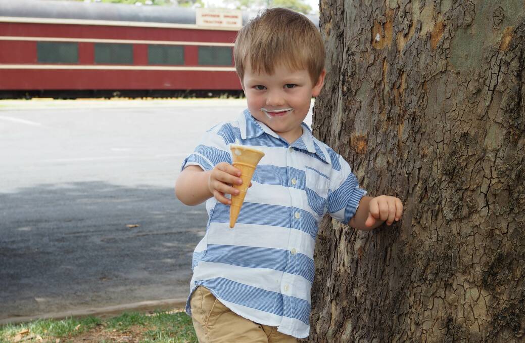 Elijah O'Keffee enjoying an ice cream.