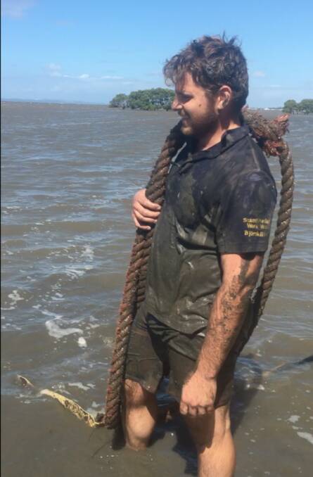 RELIEVED: Rescuer Daniel Vallis after letting the turtle free in Moreton Bay. Photo: Supplied