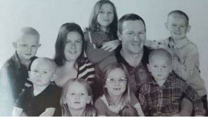Rebecca and Christopher Lambkin with their seven children. Photo: Supplied
