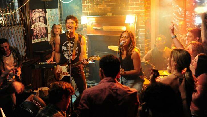 Dan (J.R. Reyne) and Billie (Jessica Mauboy) rocking it out at the local pub.