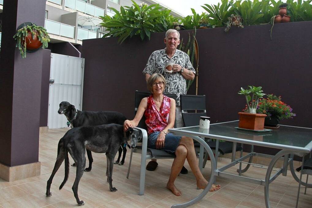 Moving on: Debbie and Chris Peterson at the Stanmore unit they are selling. Photo: Ben Rushton