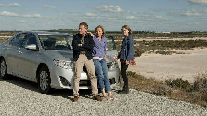 Richard Roxburgh, Radha Mitchell and Odessa Young in Looking for Grace, in which frantic parents set off to find their runaway daughter.  Photo: Supplied