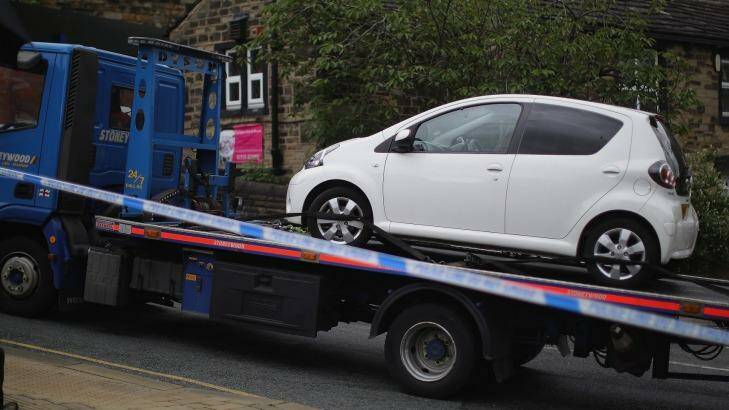 A car is removed for forensic testing near to where Jo Cox, Labour MP for Batley and Spen, was shot and stabbed outside Birstall Library. Photo: Christopher Furlong/Getty Images